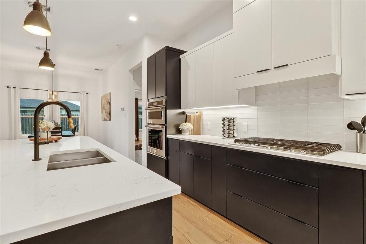 Interior, Kitchen, Pendant Lights, Recessed Lighting, Stainless Steel Appliances, Wood Texture Flooring