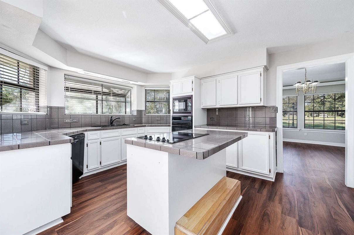 Chandelier, Interior, Kitchen, Tile Countertops, Wood Texture Flooring