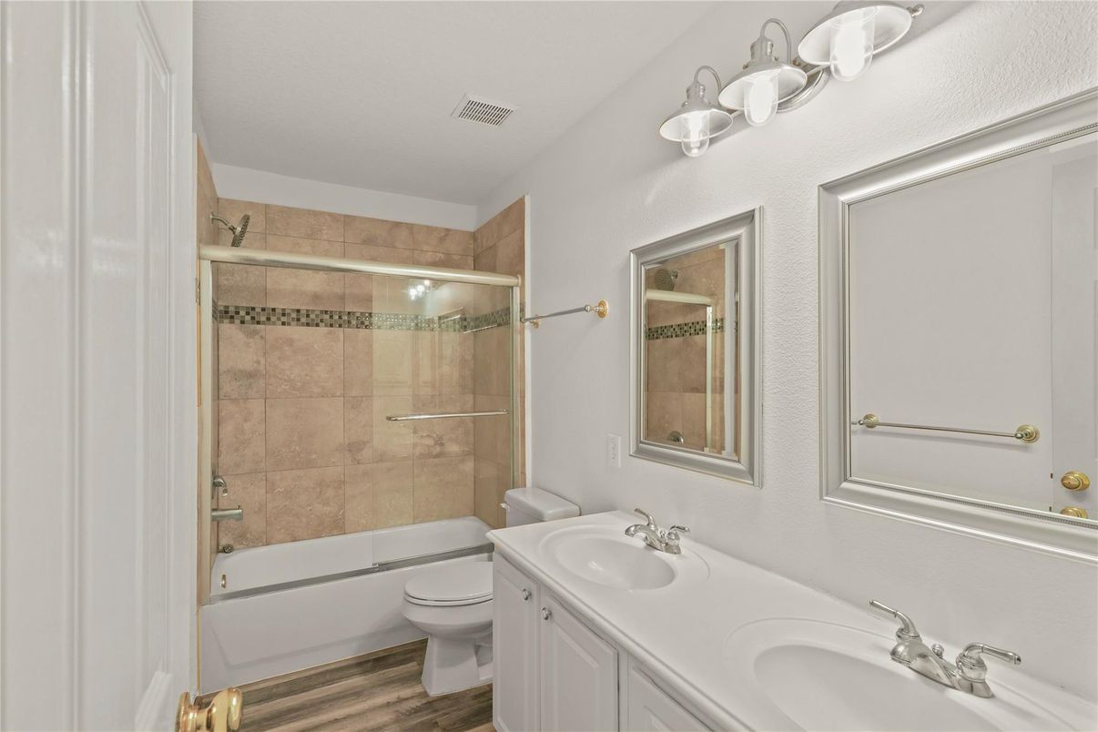 Bathroom, Dual Sink Vanities, Glass Shower, Interior, Wood Texture Flooring