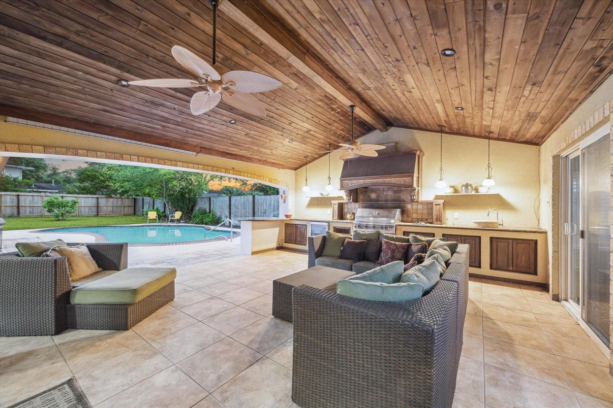 Exterior, Outdoor Kitchen, Pendant Lights, Pool, Wooden Ceilings