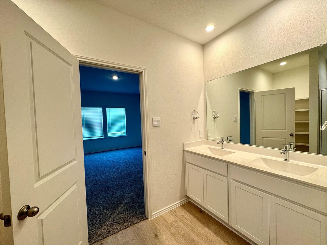 Bathroom, Dual Sink Vanities, Interior, Recessed Lighting, Wood Texture Flooring