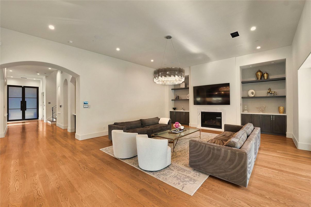 Chandelier, Fireplace, Interior, Living room, Recessed Lighting, Wood Texture Flooring