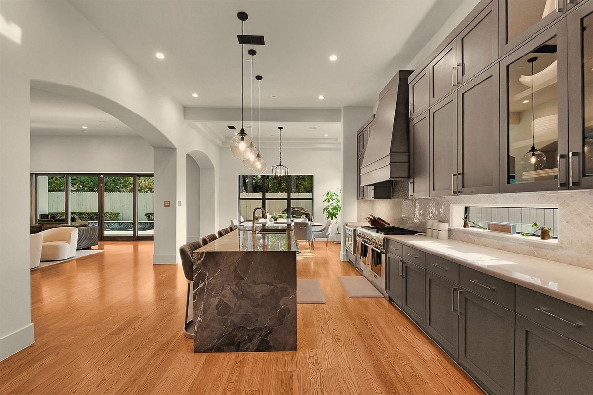 Dining room, Interior, Kitchen, Living room, Pendant Lights, Recessed Lighting, Stainless Steel Appliances, Wood Texture Flooring