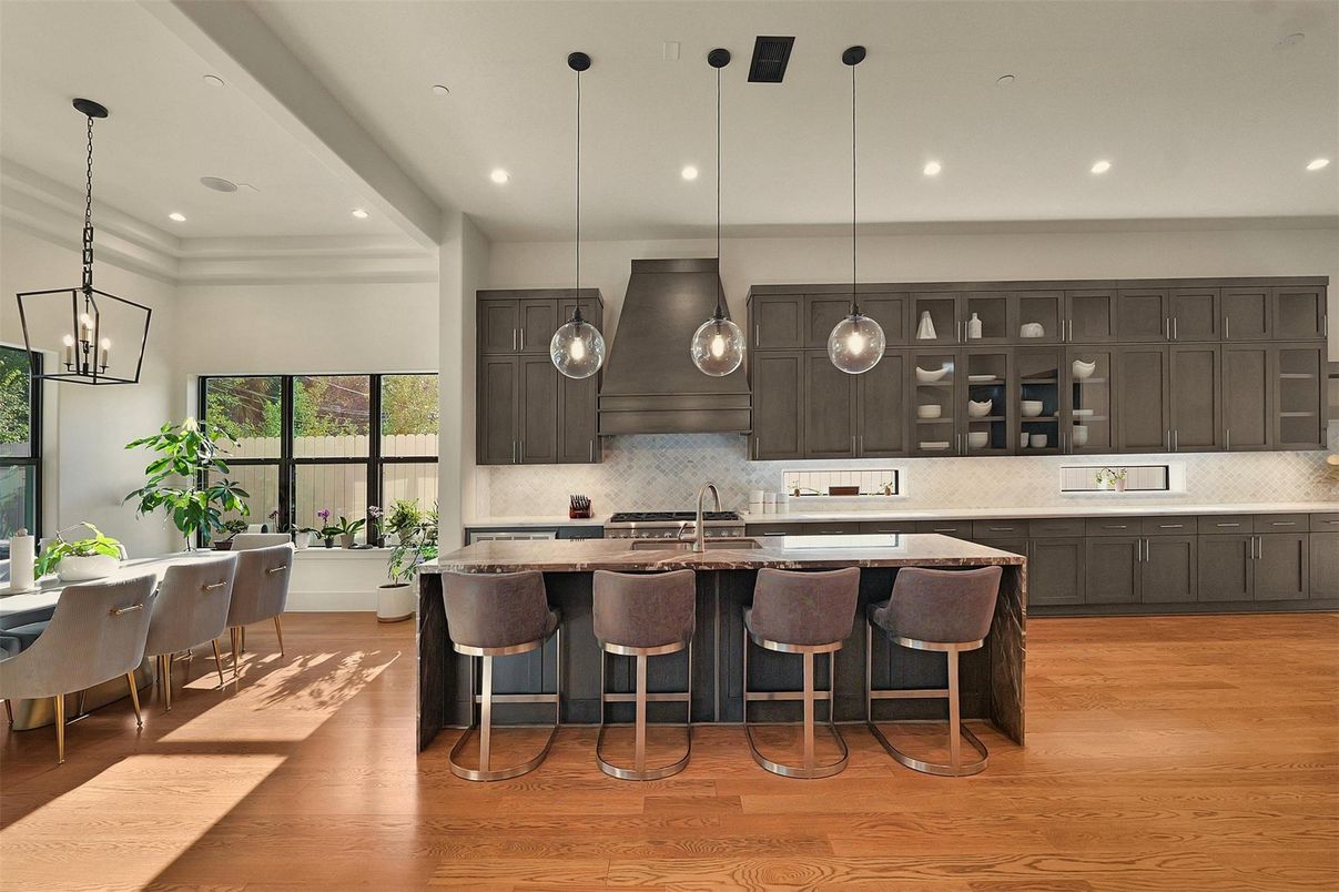 Dining room, Interior, Kitchen, Pendant Lights, Recessed Lighting, Stainless Steel Appliances, Wood Texture Flooring