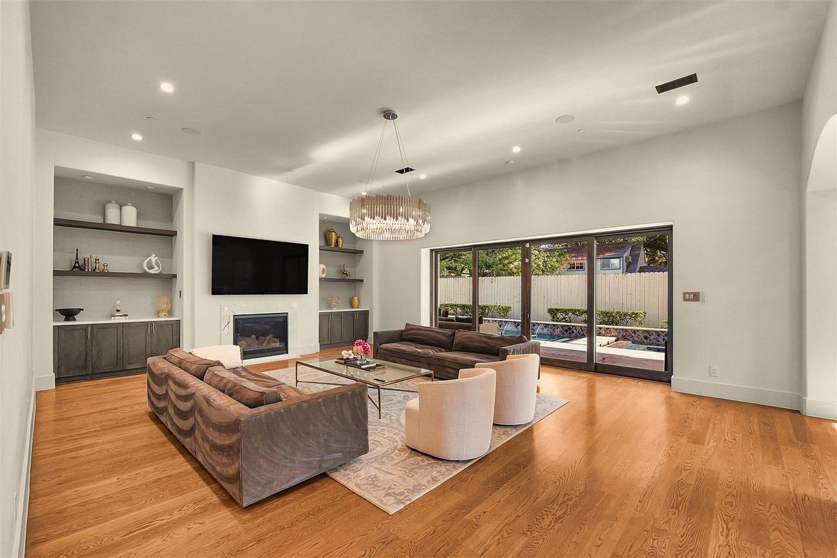 Chandelier, Fireplace, Interior, Living room, Recessed Lighting, Wood Texture Flooring