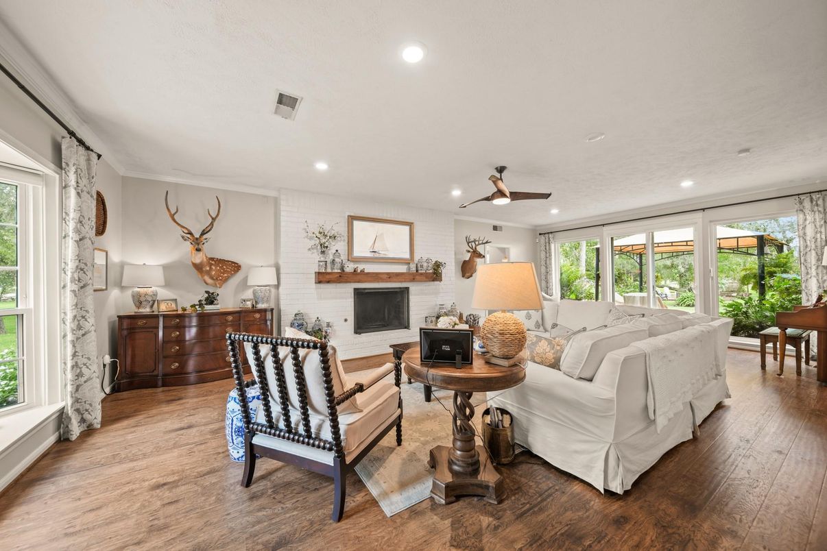 Fireplace, Interior, Living room, Recessed Lighting, Stone Walls, Wood Texture Flooring