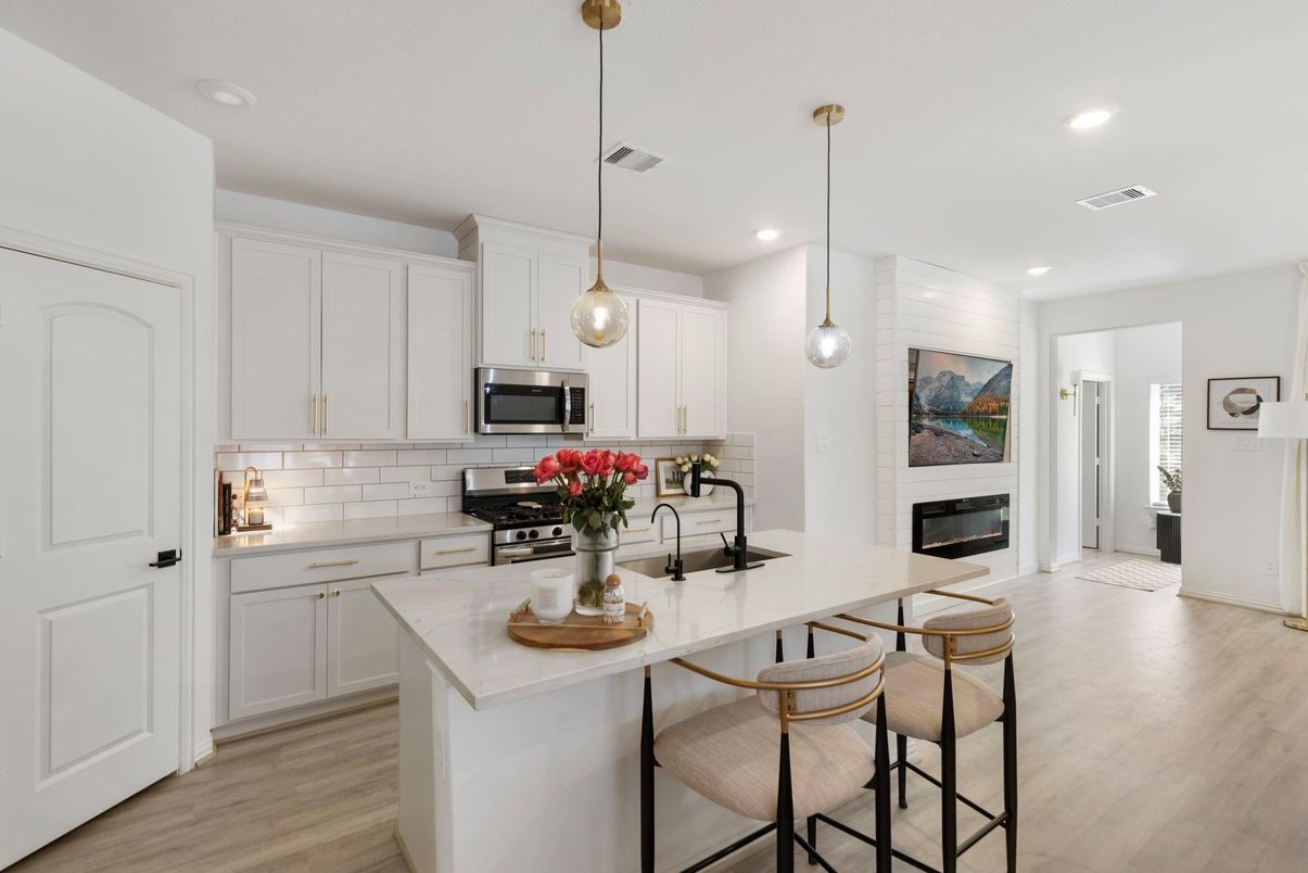 Fireplace, Interior, Kitchen, Pendant Lights, Recessed Lighting, Stainless Steel Appliances, Wood Texture Flooring