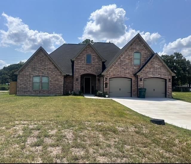 Attached, Backyard, Exterior, Facade, Brick Facade, Brick Traditional