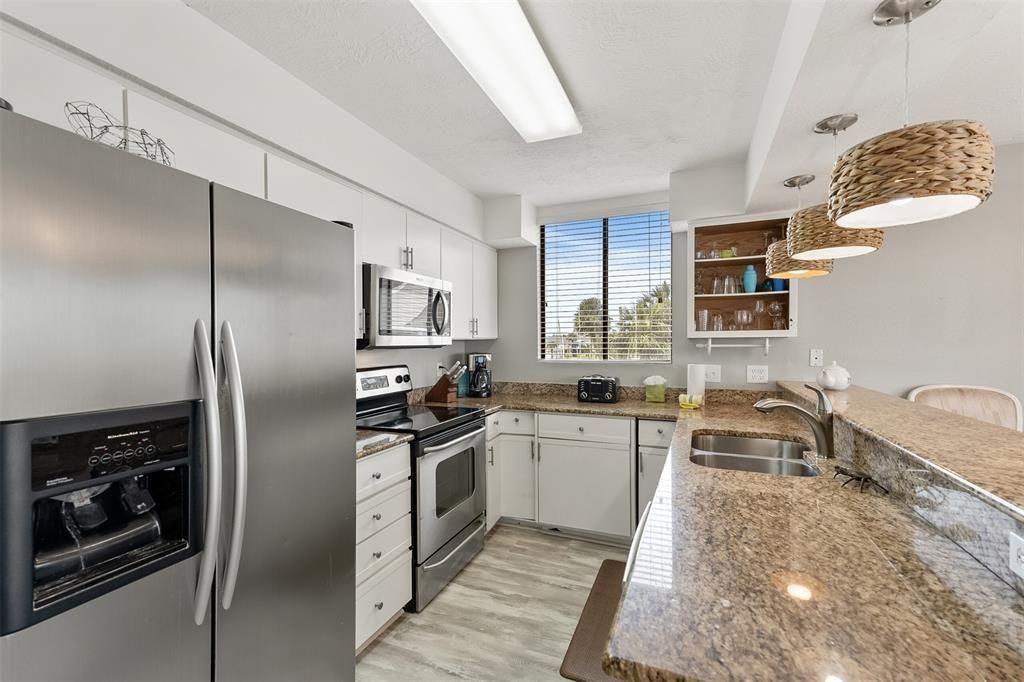 Interior, Kitchen, Pendant Lights, Stainless Steel Appliances, Wood Texture Flooring