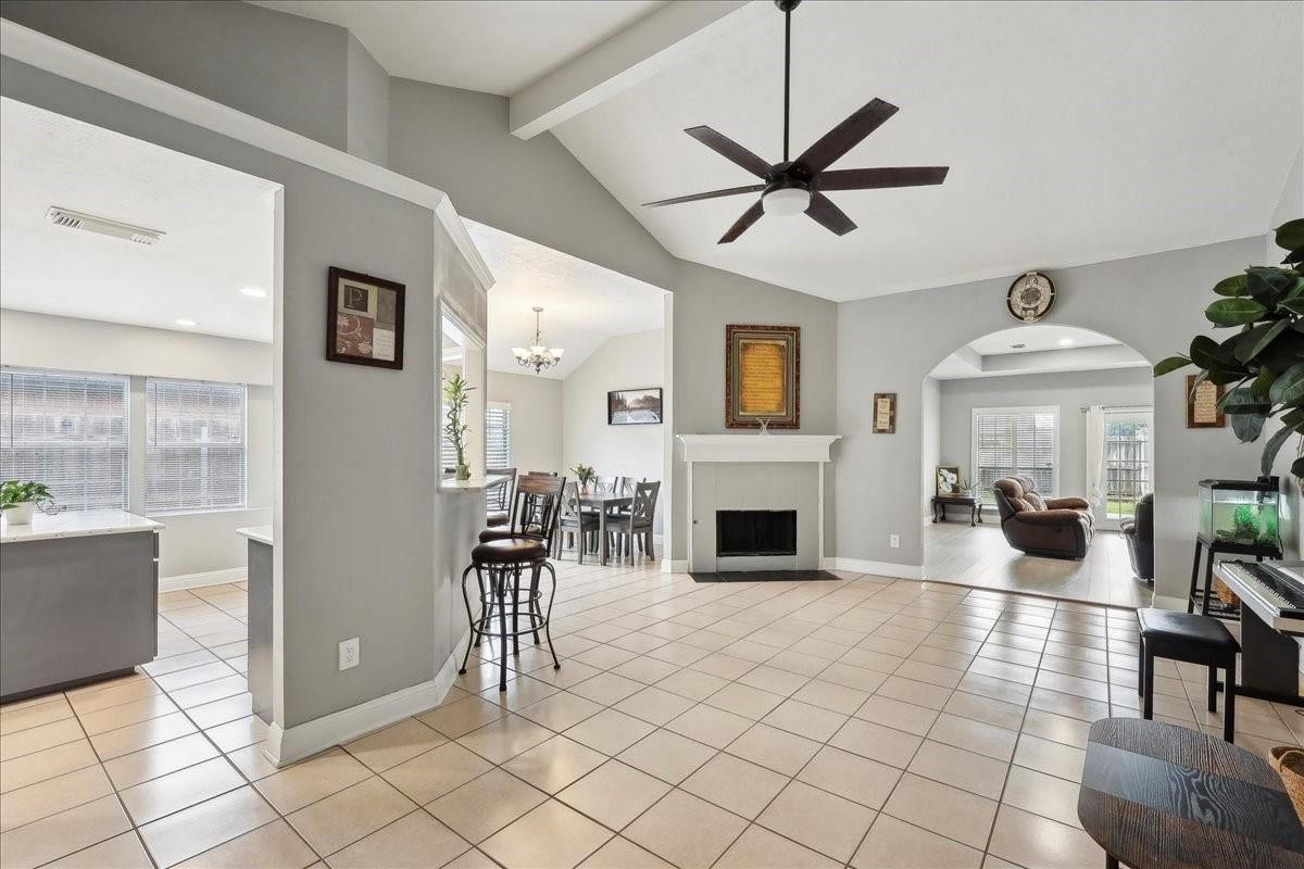 Chandelier, Dining room, Fireplace, Interior, Piano, Recessed Lighting