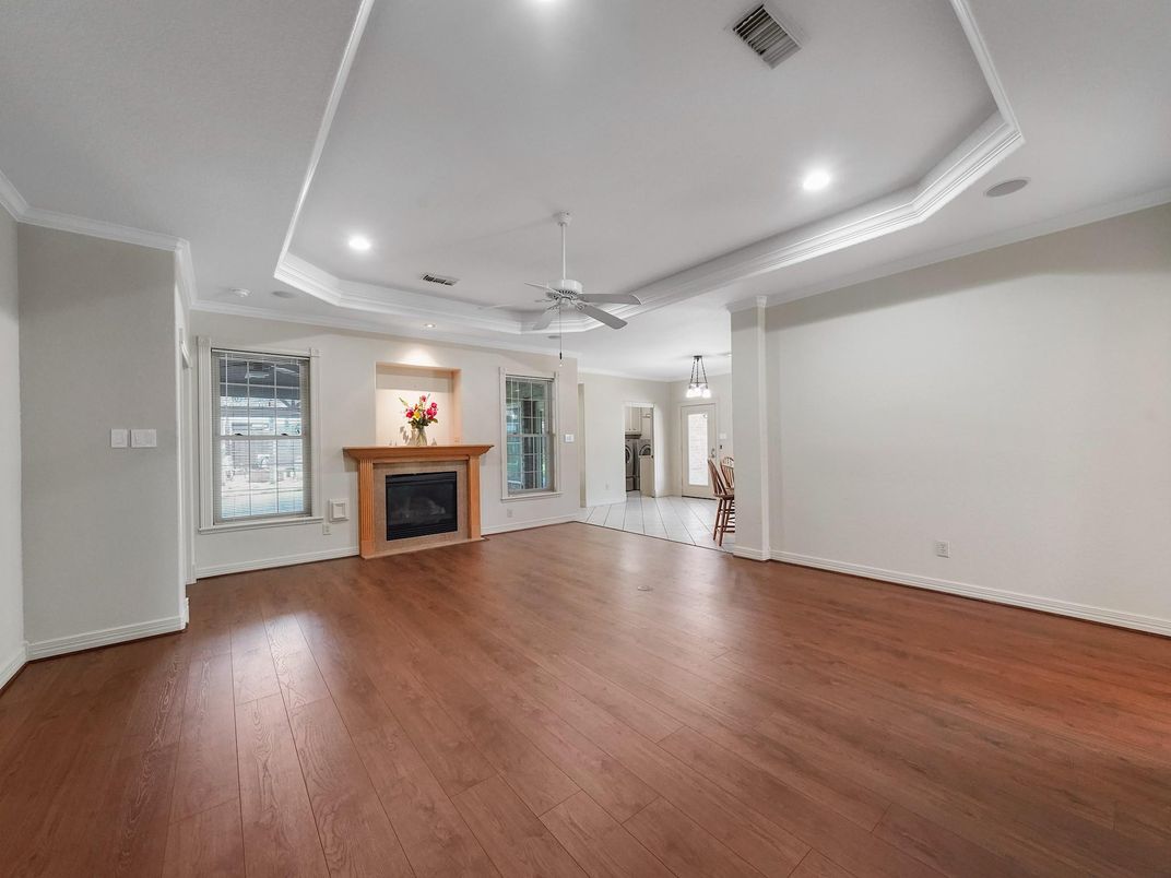 Empty room, Fireplace, Interior, Pendant Lights, Recessed Lighting, Wood Texture Flooring