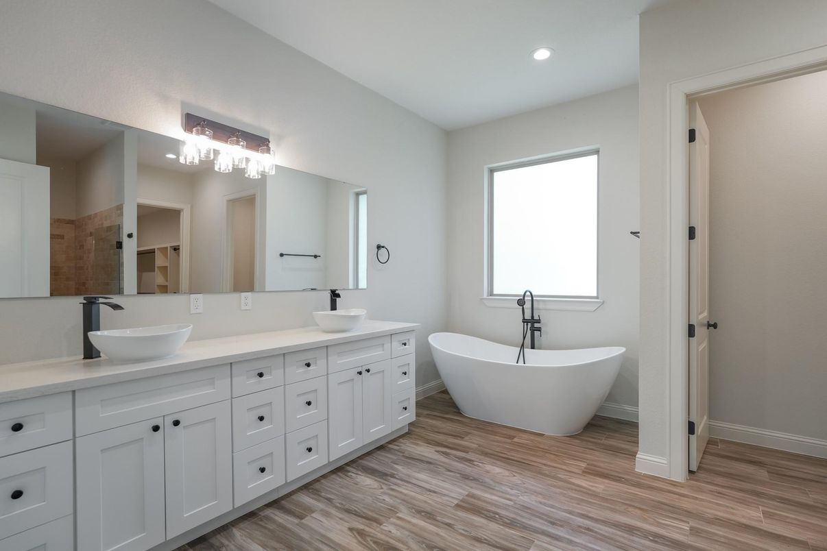 Bathroom, Dual Sink Vanities, Free Standing Baths, Interior, Recessed Lighting, Wood Texture Flooring