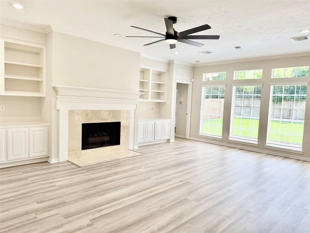Empty room, Fireplace, Interior, Recessed Lighting, Wood Texture Flooring