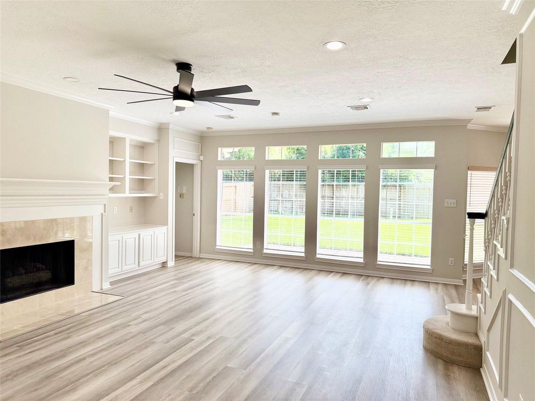 Empty room, Fireplace, Interior, Recessed Lighting, Wood Texture Flooring