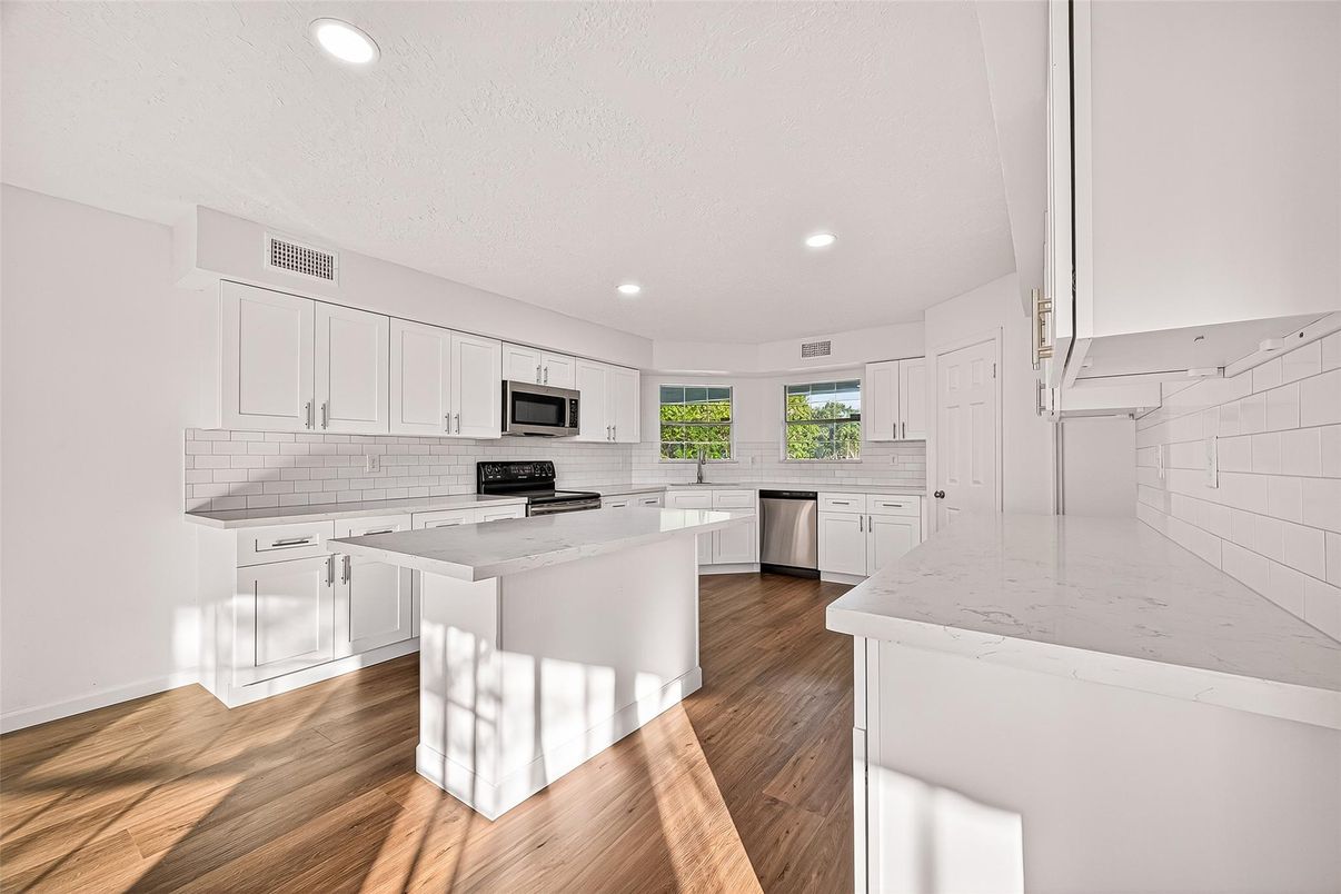 Interior, Kitchen, Recessed Lighting, Stainless Steel Appliances, Wood Texture Flooring