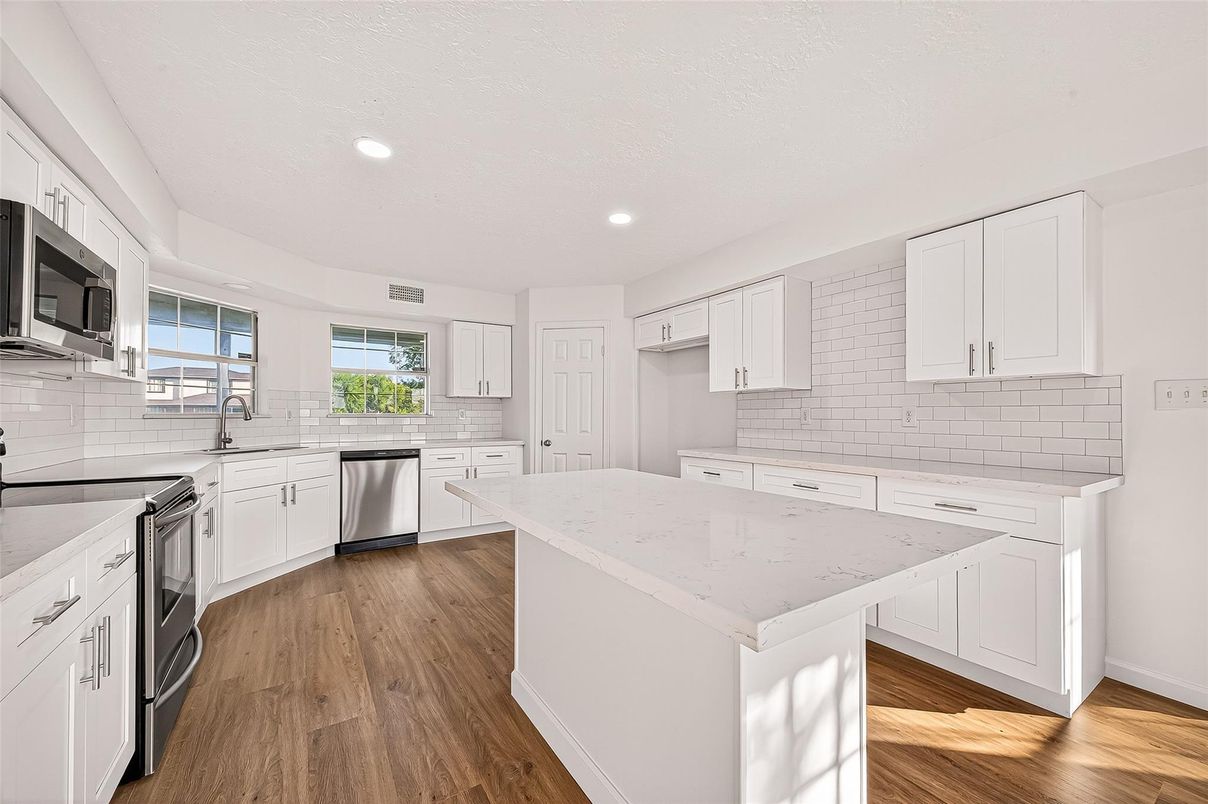 Interior, Kitchen, Recessed Lighting, Stainless Steel Appliances, Wood Texture Flooring