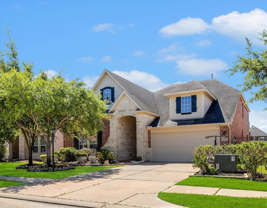Attached, Exterior, Facade, Brick Facade, Brick Traditional