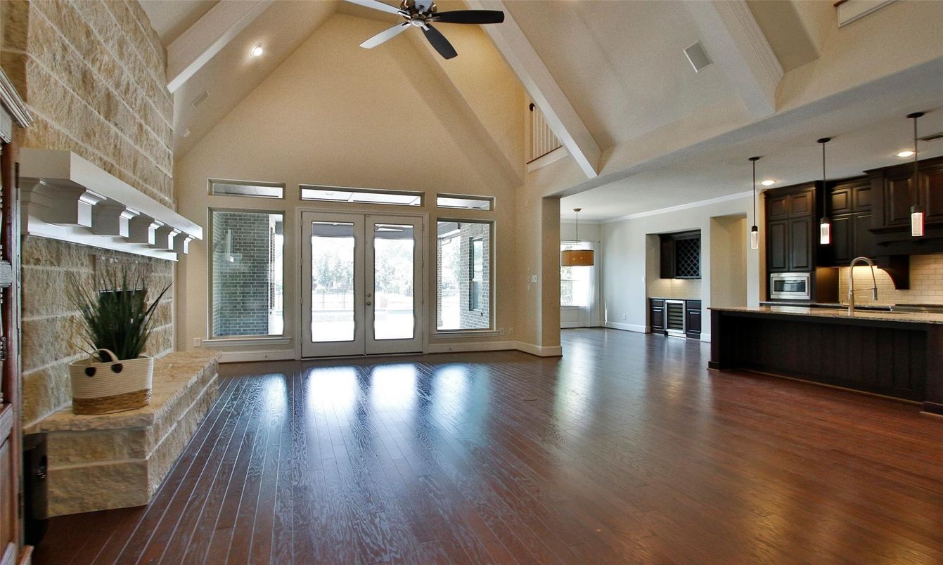 Interior, Kitchen, Pendant Lights, Recessed Lighting, Stainless Steel Appliances, Stone Walls, Wood Texture Flooring