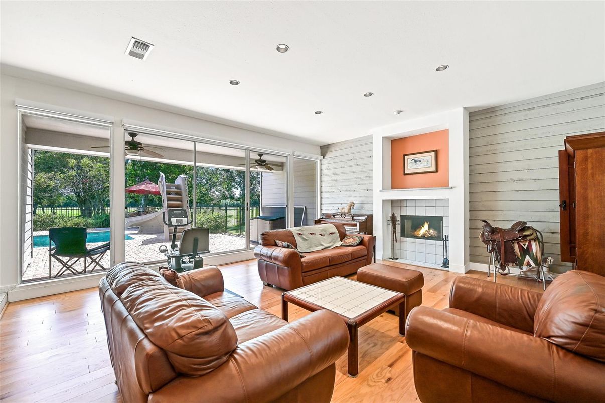 Fireplace, Interior, Living room, Recessed Lighting, Wood Texture Flooring