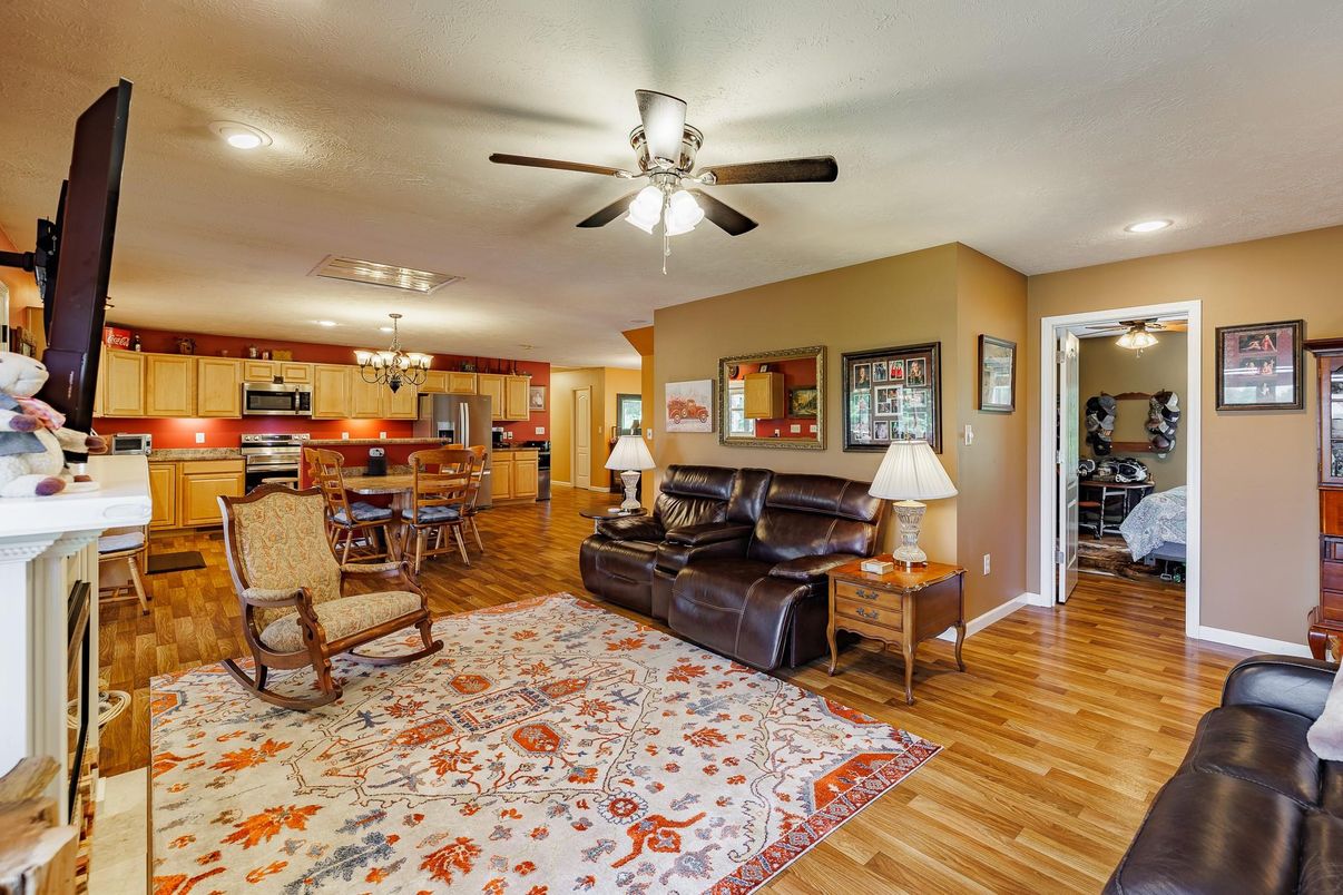 Chandelier, Dining room, Interior, Kitchen, Living room, Recessed Lighting, Stainless Steel Appliances, Wood Texture Flooring