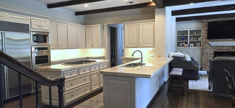 Fireplace, Interior, Kitchen, Recessed Lighting, Stainless Steel Appliances, Stone Walls, Wooden Beams, Wood Texture Flooring