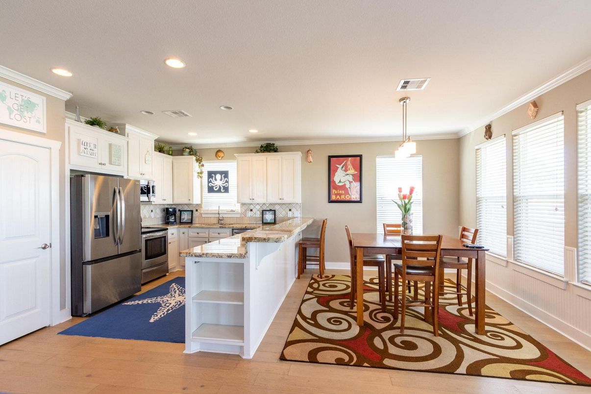 Dining room, Interior, Kitchen, Pendant Lights, Recessed Lighting, Stainless Steel Appliances, Wood Texture Flooring