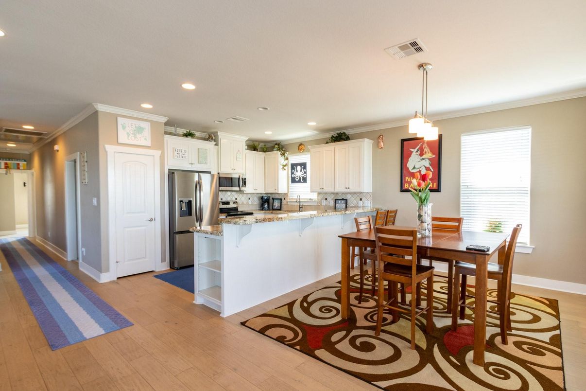 Dining room, Interior, Kitchen, Pendant Lights, Recessed Lighting, Stainless Steel Appliances, Wood Texture Flooring