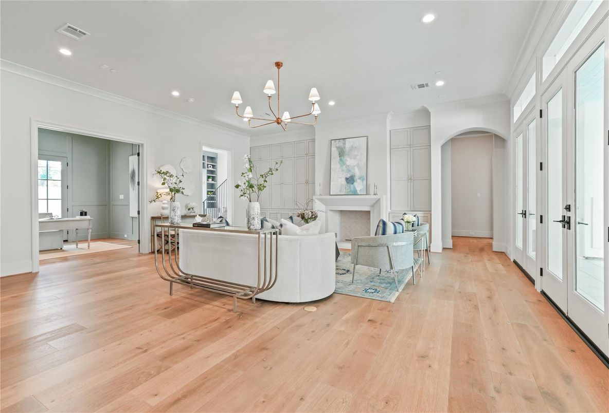 Chandelier, Fireplace, Interior, Living room, Pendant Lights, Recessed Lighting, Wood Texture Flooring