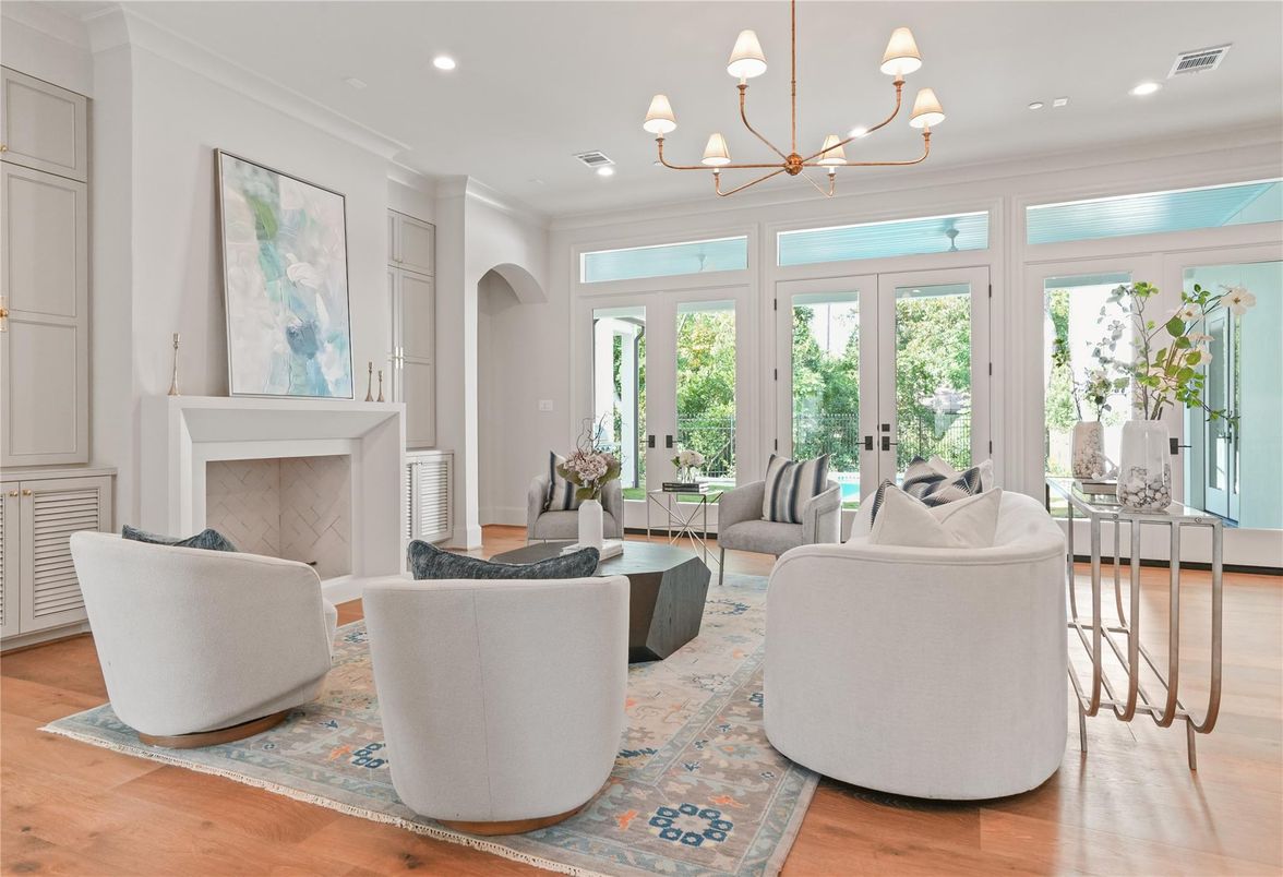 Chandelier, Fireplace, Interior, Living room, Recessed Lighting, Wood Texture Flooring