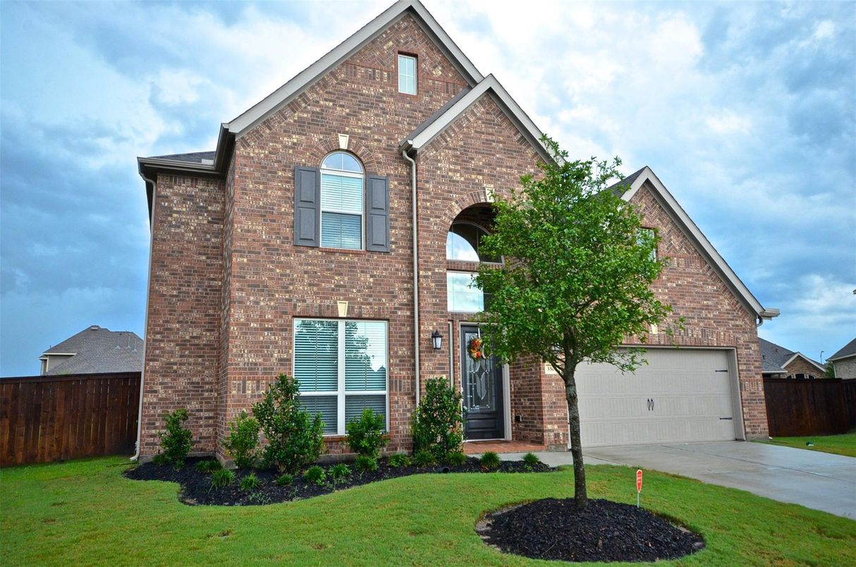 Attached, Exterior, Facade, Brick Facade, Brick Traditional