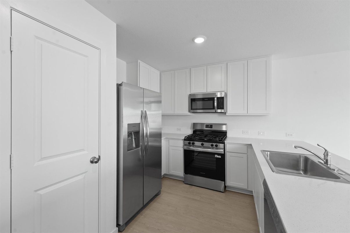 Interior, Kitchen, Recessed Lighting, Stainless Steel Appliances, Wood Texture Flooring