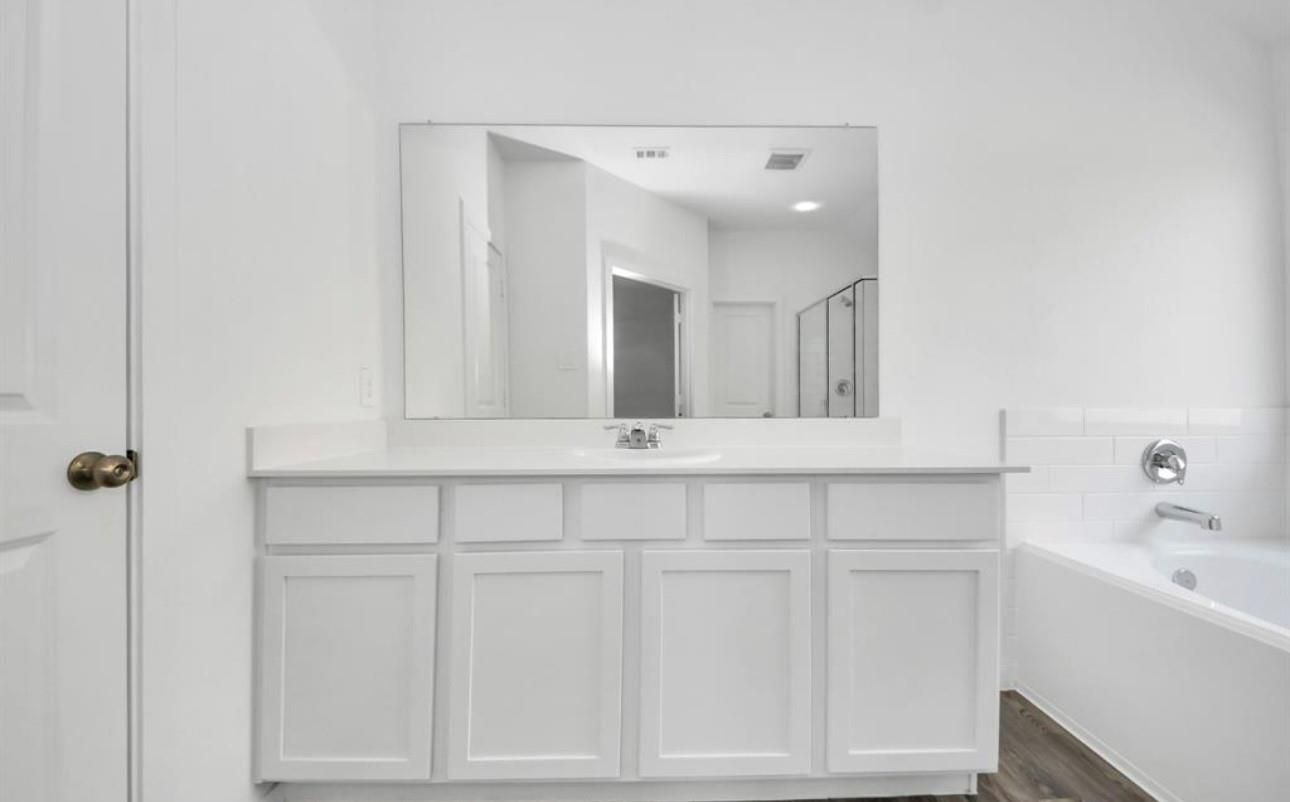 Bathroom, Dual Sink Vanities, Interior, Recessed Lighting, Wood Texture Flooring