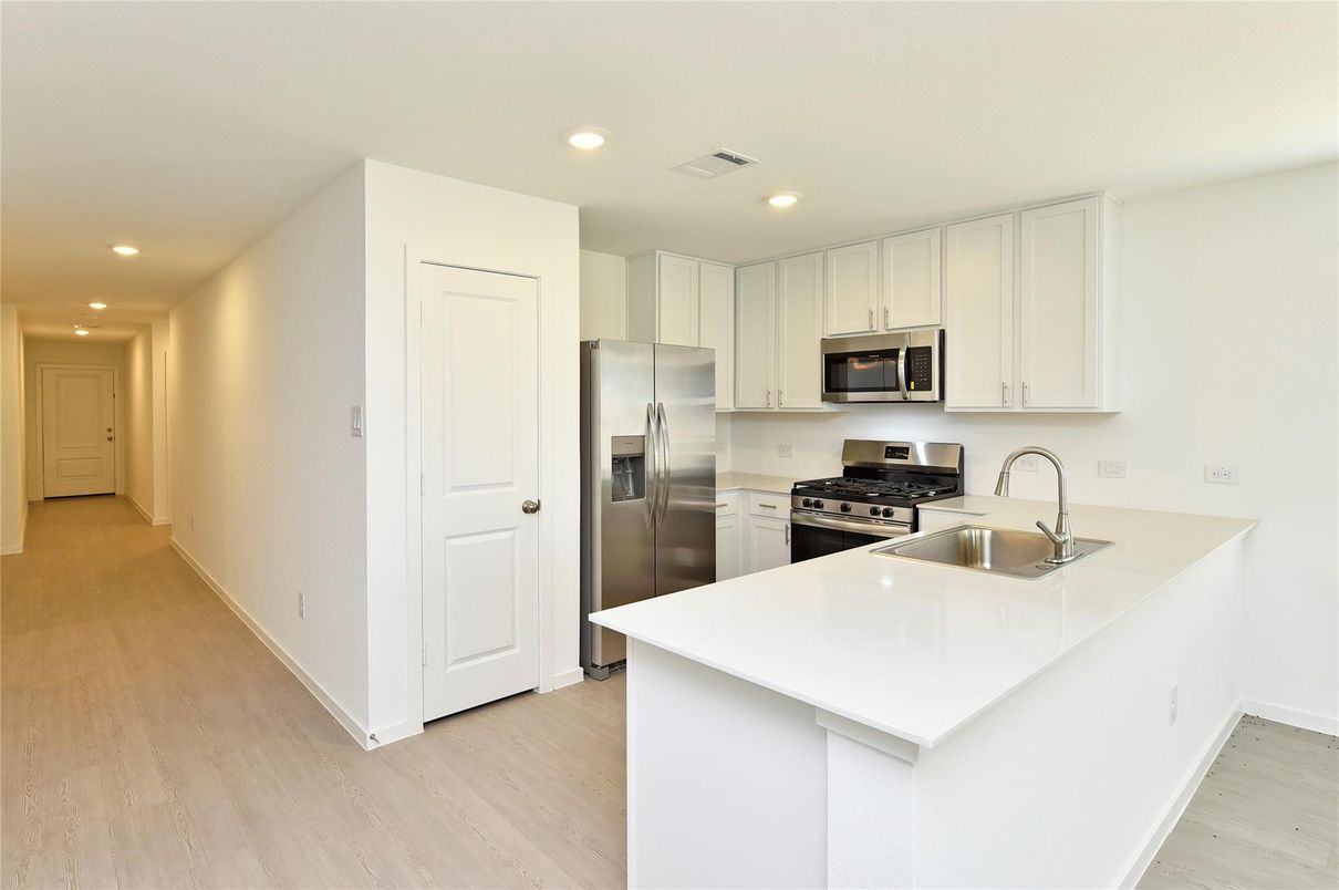 Interior, Kitchen, Recessed Lighting, Stainless Steel Appliances, Wood Texture Flooring