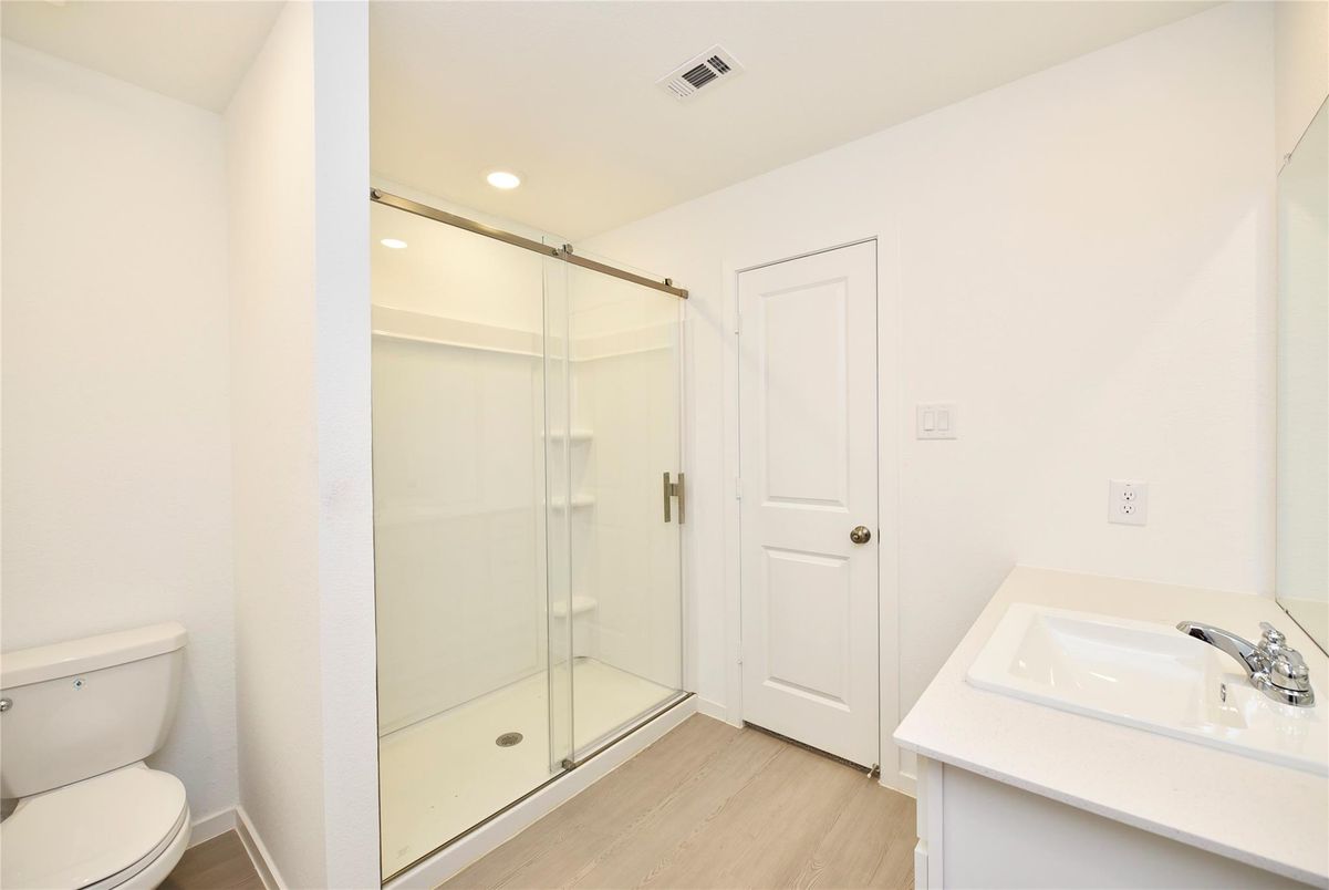 Bathroom, Glass Shower, Interior, Recessed Lighting, Wood Texture Flooring
