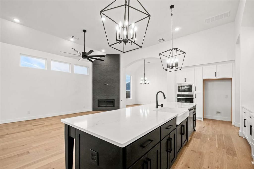 Fireplace, Interior, Kitchen, Pendant Lights, Recessed Lighting, Wood Texture Flooring