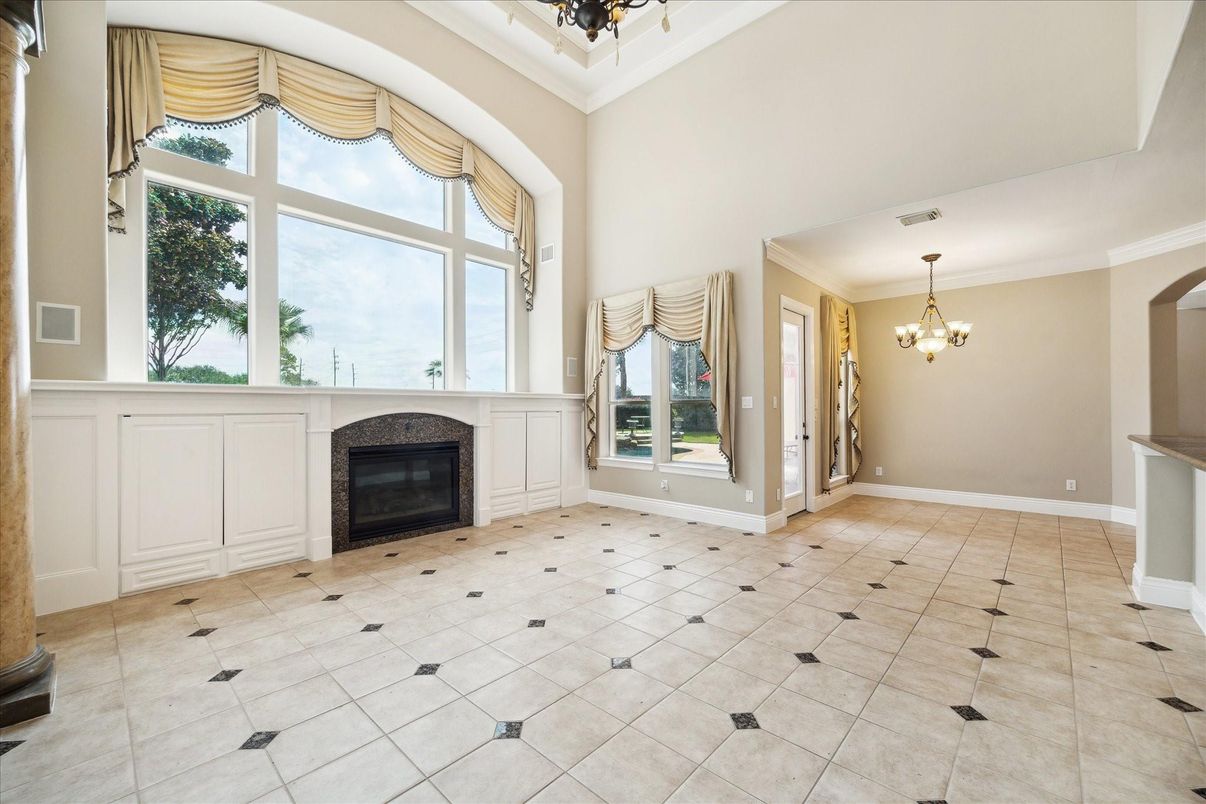 Chandelier, Empty room, Fireplace, Interior