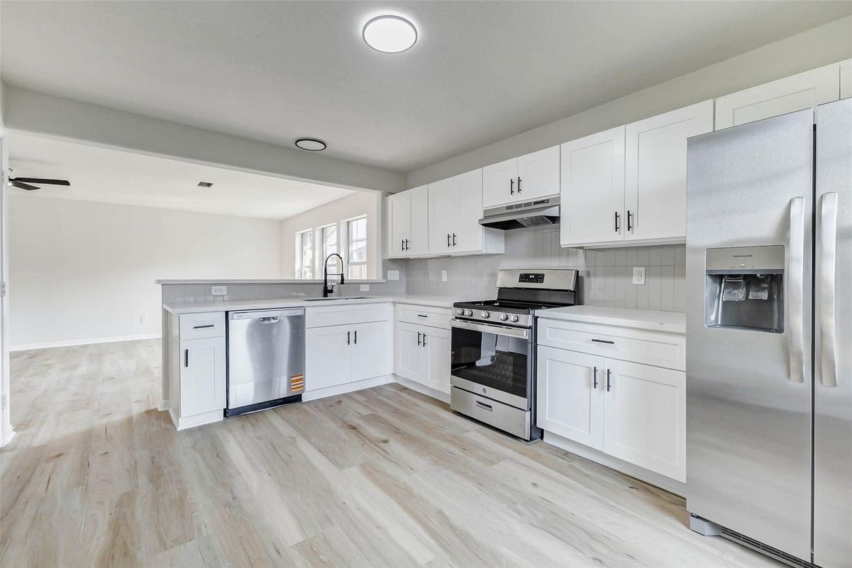 Interior, Kitchen, Recessed Lighting, Stainless Steel Appliances, Wood Texture Flooring