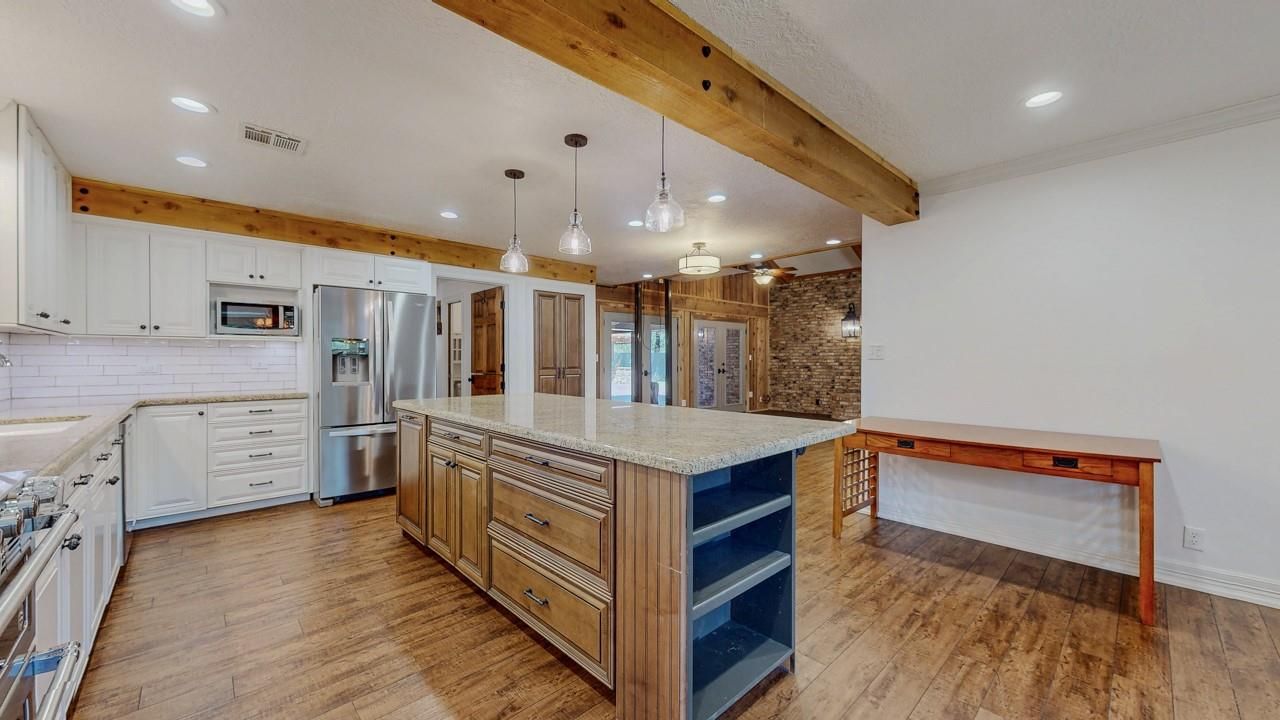 Interior, Kitchen, Pendant Lights, Recessed Lighting, Stainless Steel Appliances, Stone Walls, Wooden Beams, Wood Texture Flooring