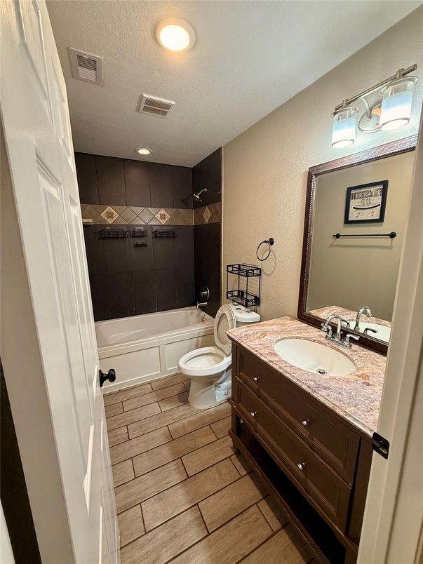 Bathroom, Dual Sink Vanities, Interior, Recessed Lighting, Wood Texture Flooring
