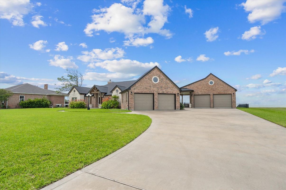 Attached, Backyard, Exterior, Facade, Brick Facade, Brick Traditional