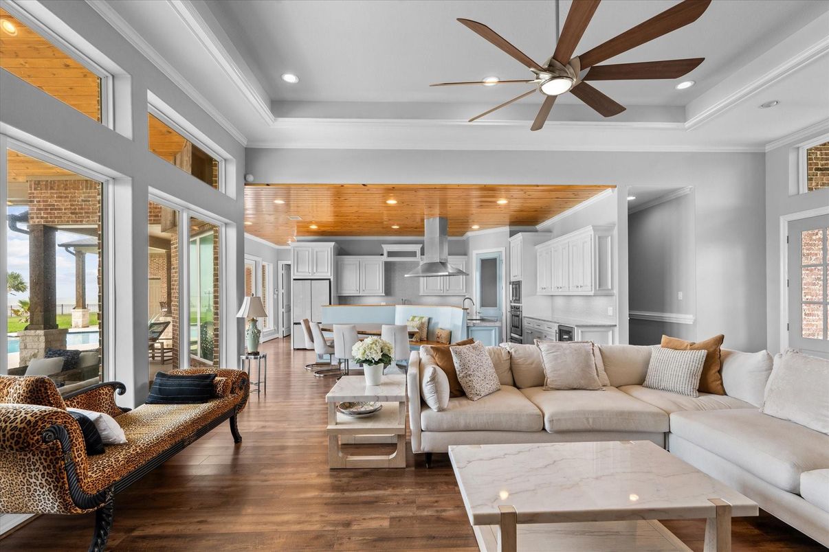 Dining room, Interior, Kitchen, Living room, Pendant Lights, Recessed Lighting, Stainless Steel Appliances, Wooden Ceilings, Wood Texture Flooring