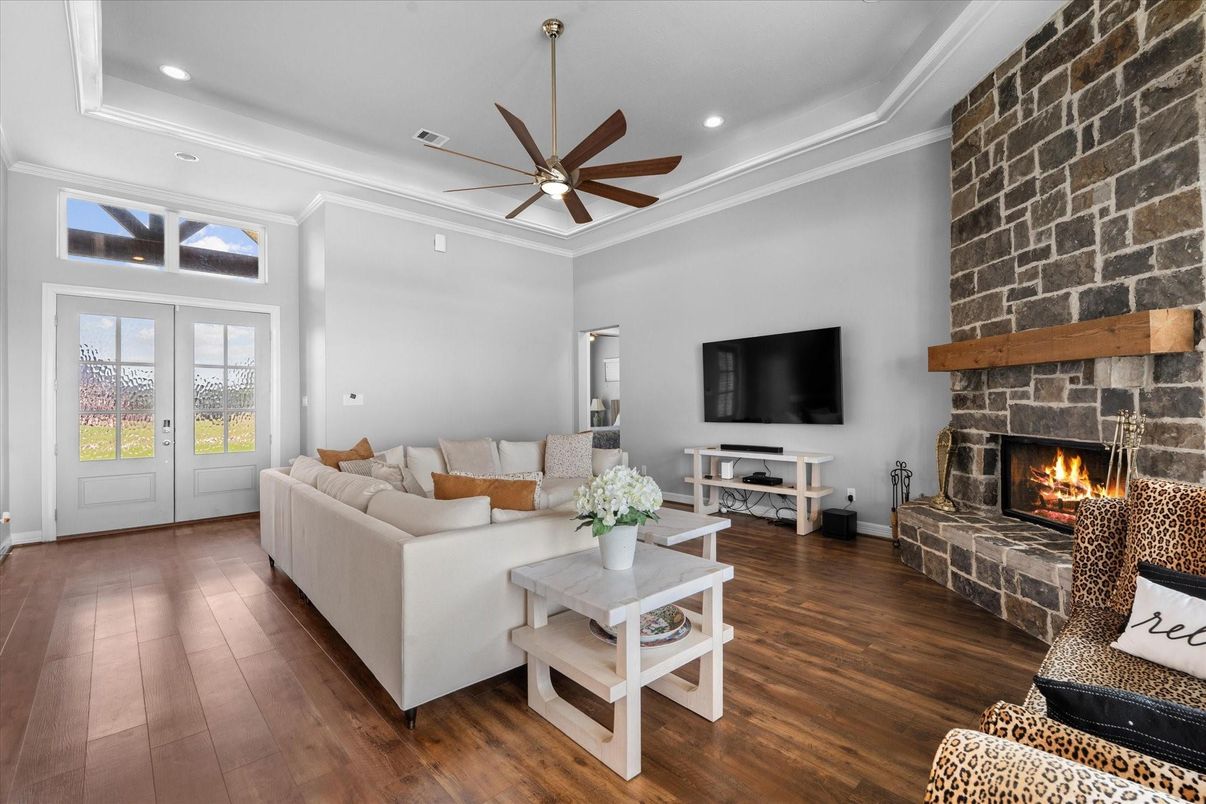 Fireplace, Interior, Living room, Recessed Lighting, Stone Walls, Wood Texture Flooring