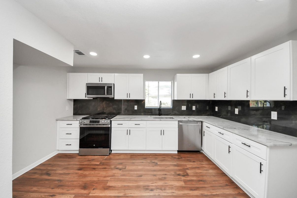Interior, Kitchen, Recessed Lighting, Stainless Steel Appliances, Wood Texture Flooring