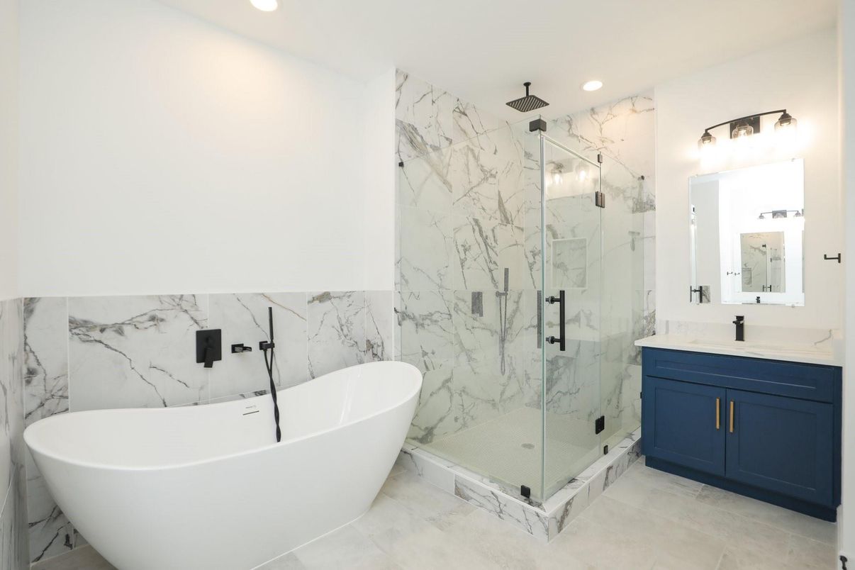 Bathroom, Free Standing Baths, Glass Shower, Interior, Marble Walls, Recessed Lighting