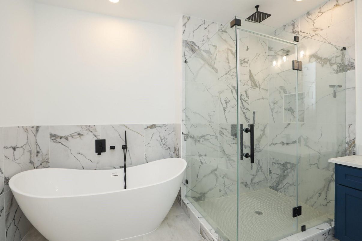 Bathroom, Free Standing Baths, Glass Shower, Interior, Marble Walls, Recessed Lighting