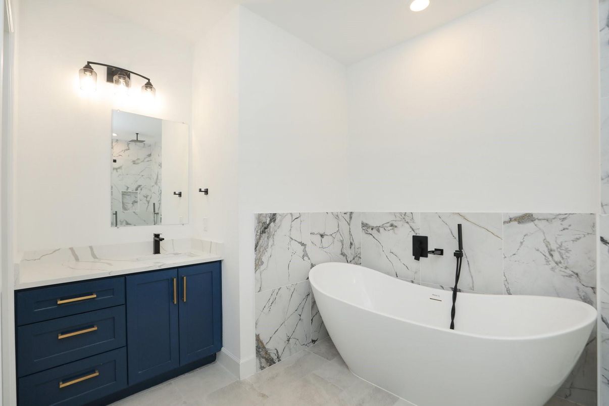 Bathroom, Dual Sink Vanities, Free Standing Baths, Interior, Marble, Marble Walls, Recessed Lighting