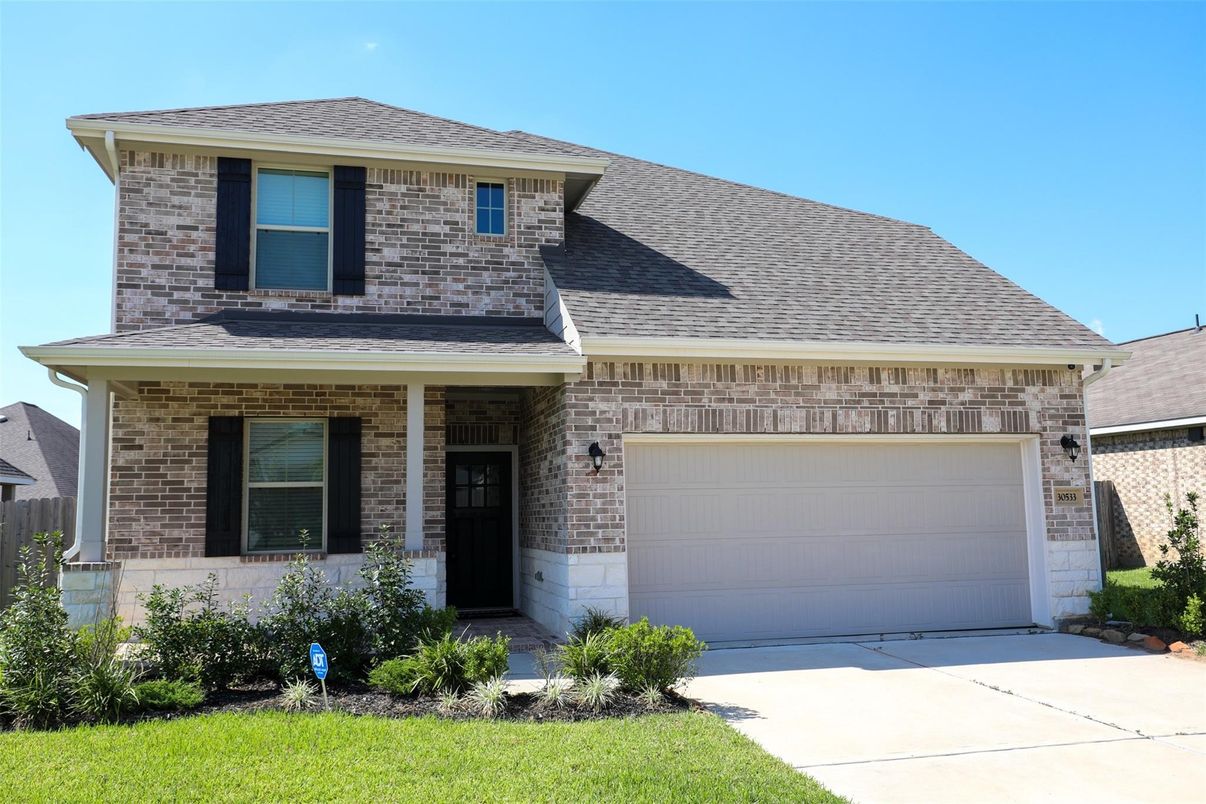 Attached, Exterior, Facade, Brick Facade, Brick Traditional