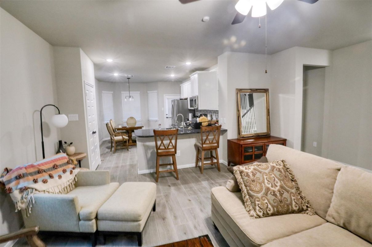 Dining room, Interior, Kitchen, Living room, Pendant Lights, Recessed Lighting, Stainless Steel Appliances, Wood Texture Flooring