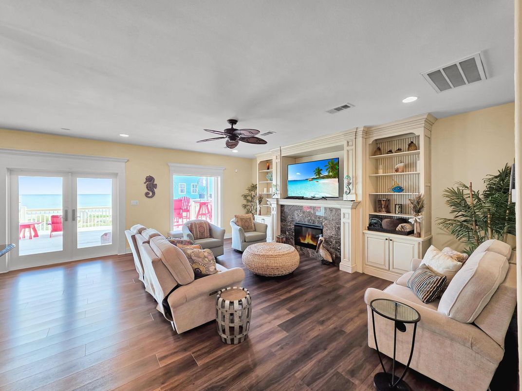 Fireplace, Interior, Living room, Recessed Lighting, Water, Wood Texture Flooring