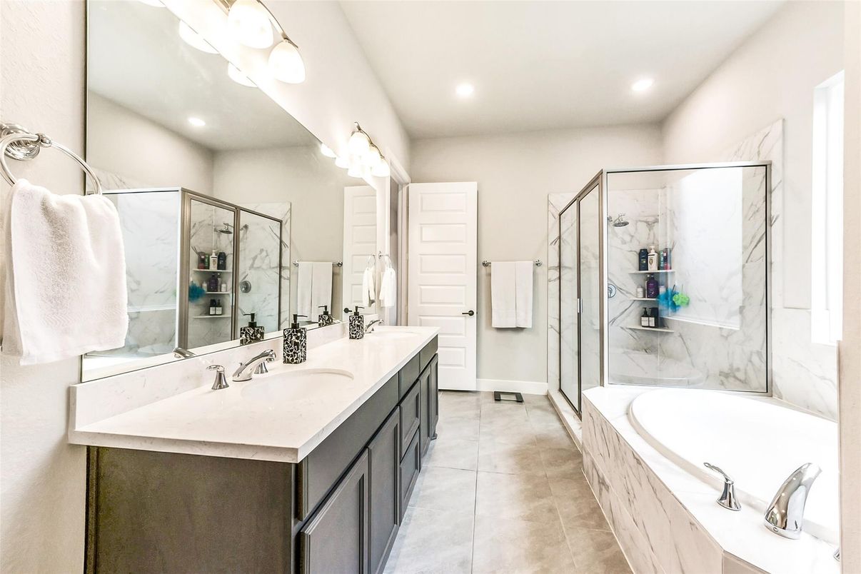 Bathroom, Dual Sink Vanities, Glass Shower, Interior, Marble Walls, Recessed Lighting